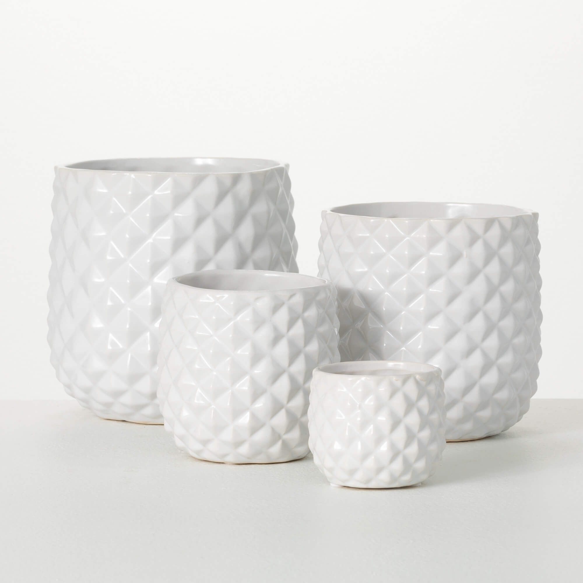 FACETED GLAZED IVORY PLANTERS