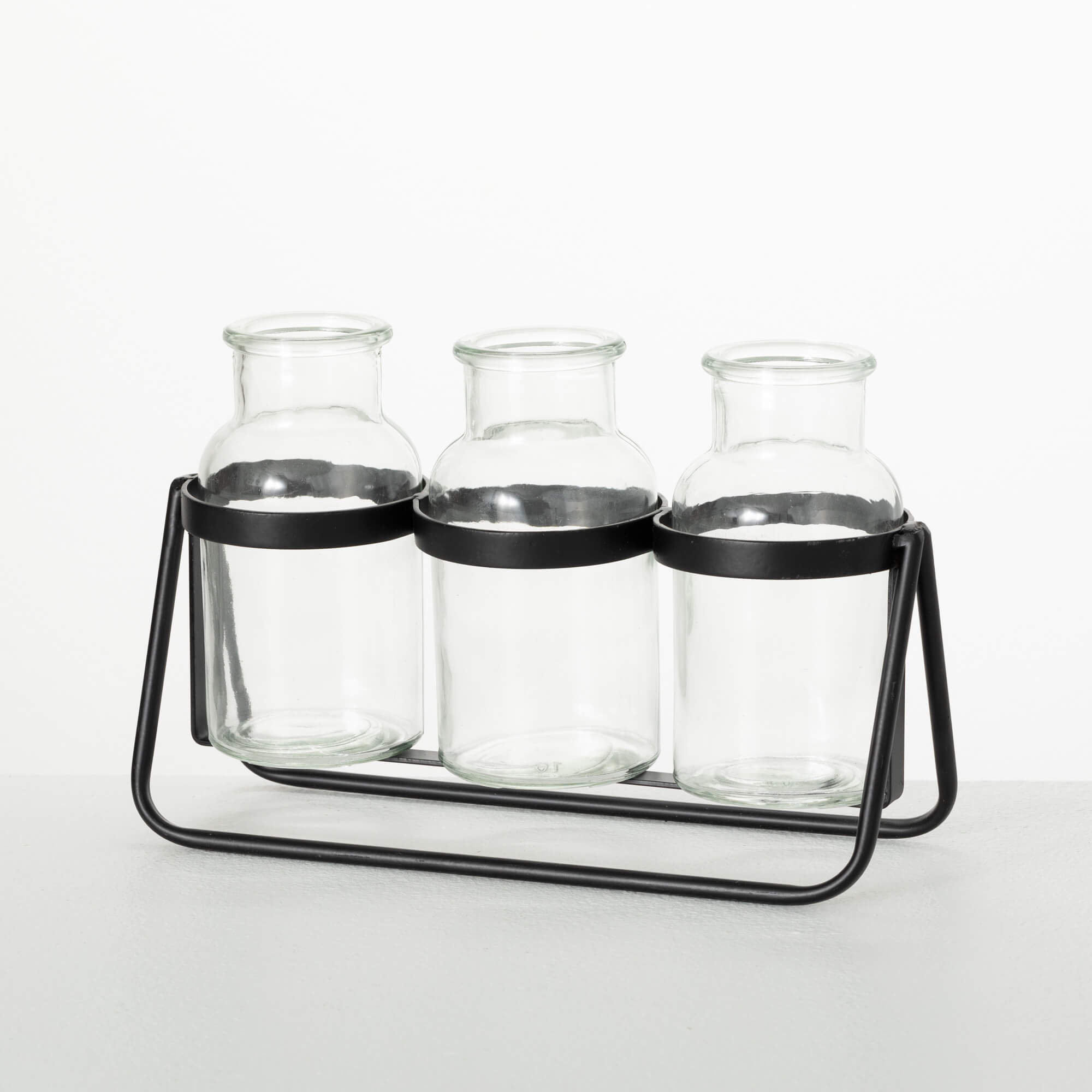 BOTTLE VASE TRIO ON METAL BASE