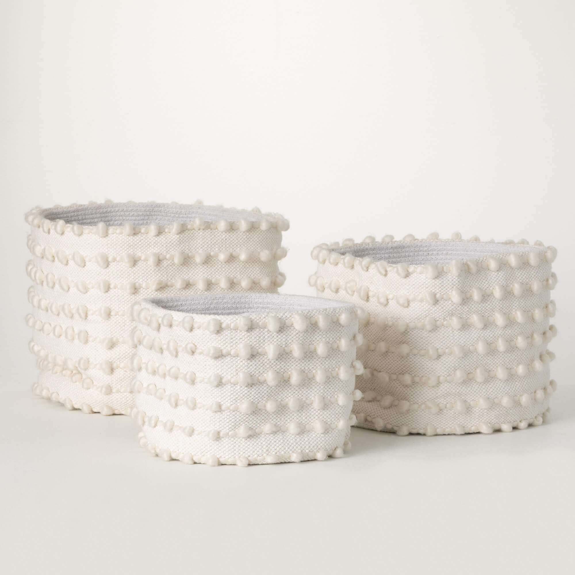 NESTING IVORY TEXTILE BASKETS