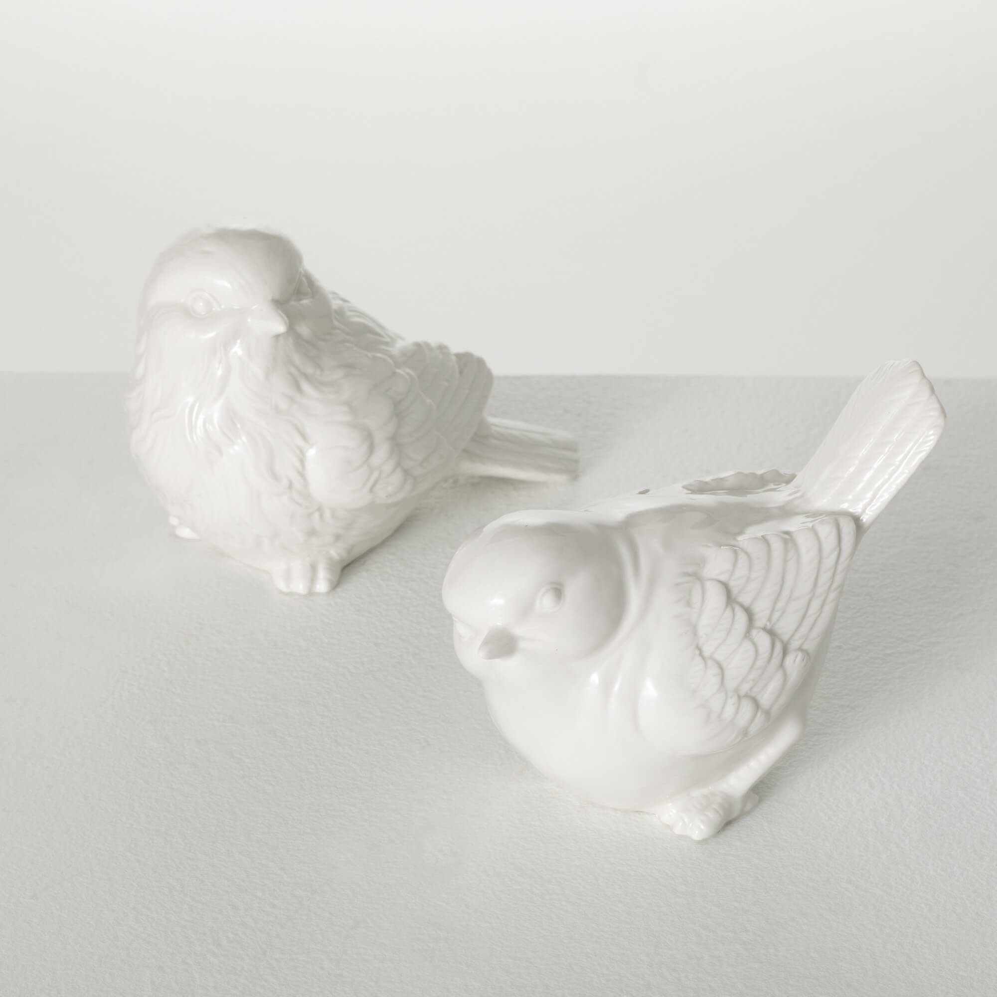 WHITE CERAMIC BIRD FIGURINES