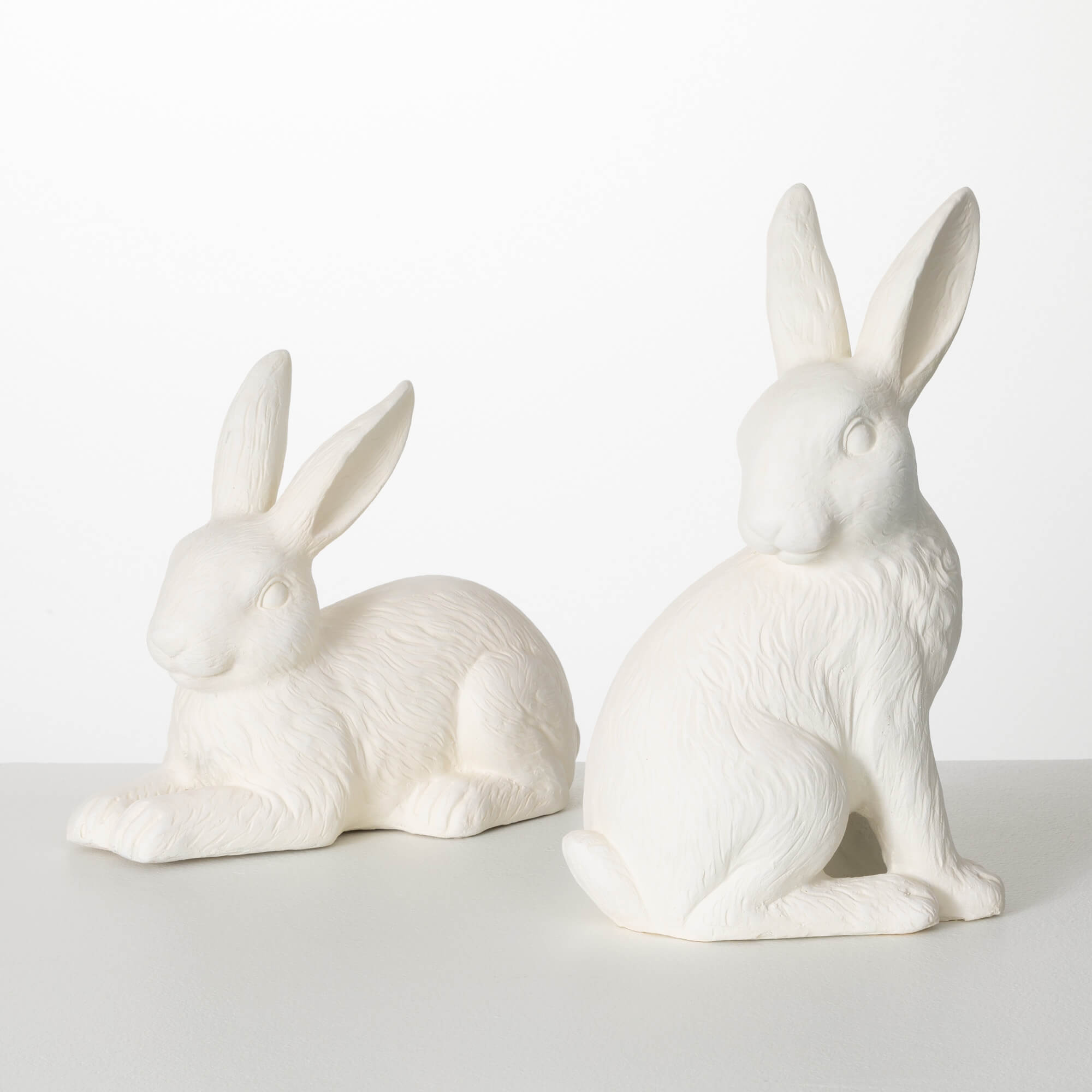 WHITE ASTREX BUNNY FIGURINES