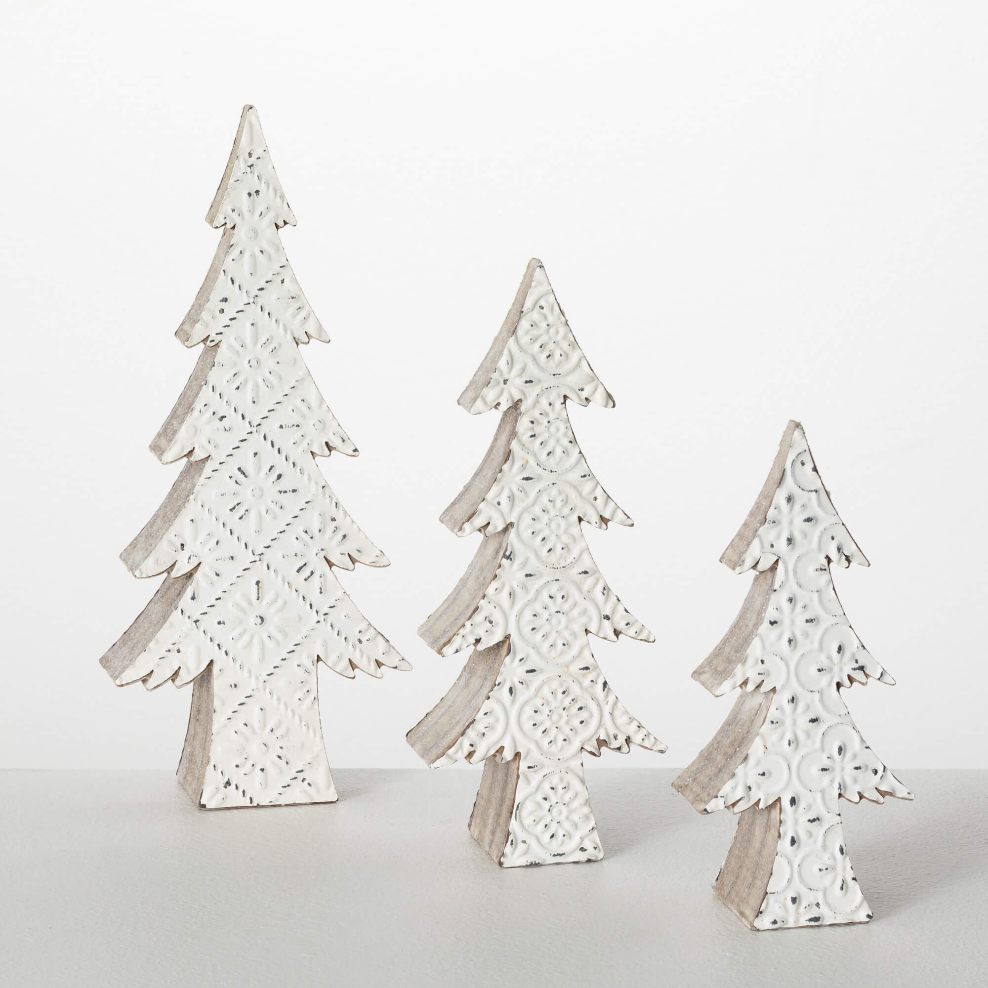 WHITE EMBOSSED TREE FIGURINES