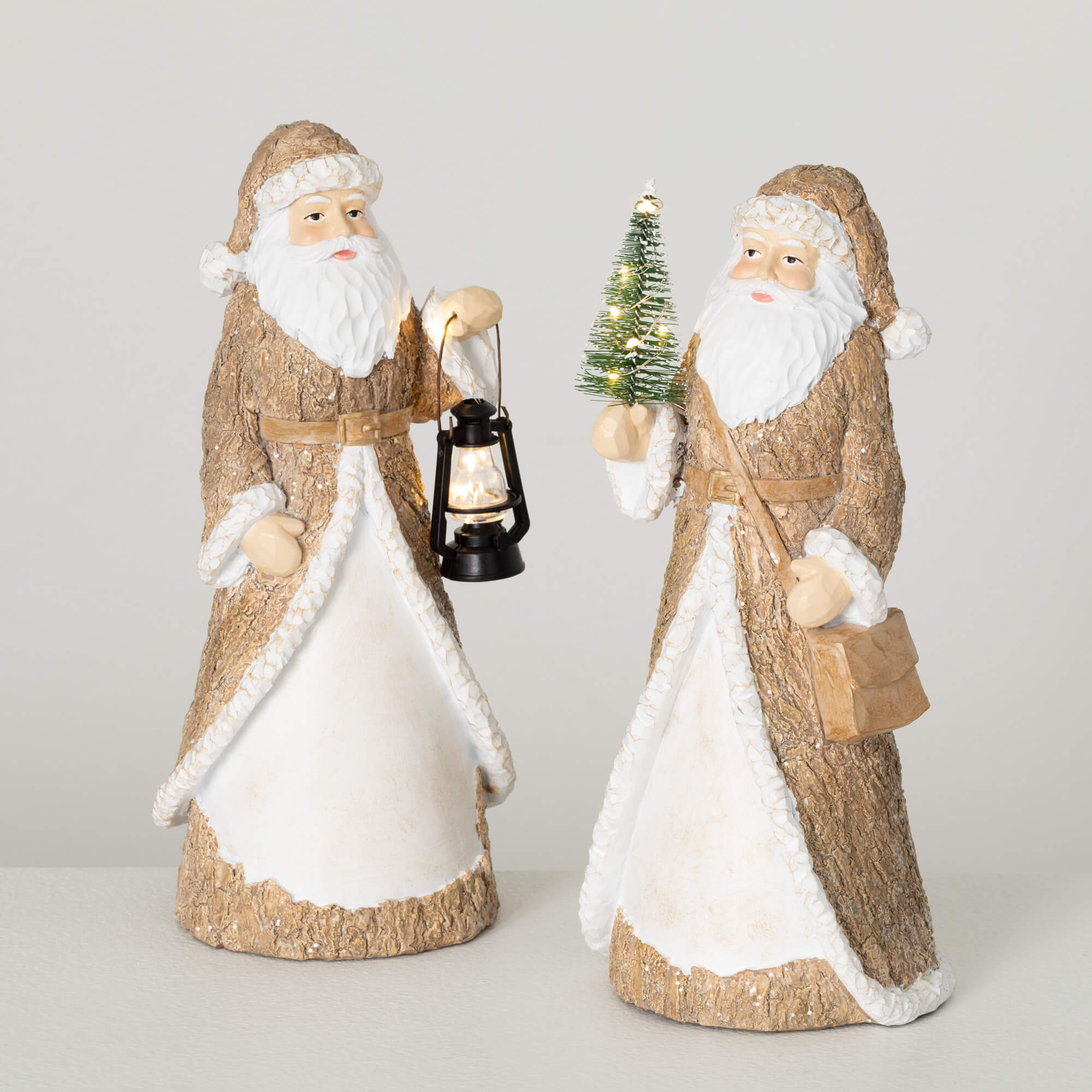 WOODLAND RESIN SANTA SET OF 2